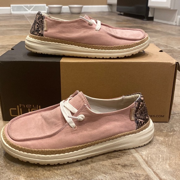 Hey dudes. Pink w/ snake print. Slightly worn. - Picture 1 of 5